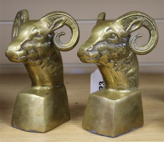 A pair of cast brass rams head bookends, 6.5in.